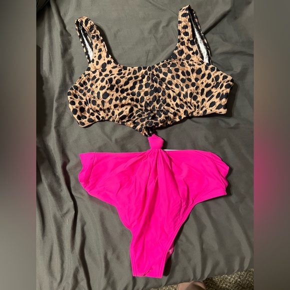Pink Lily Other - Cheetah print and hot pink one piece from Pink Lily Boutique